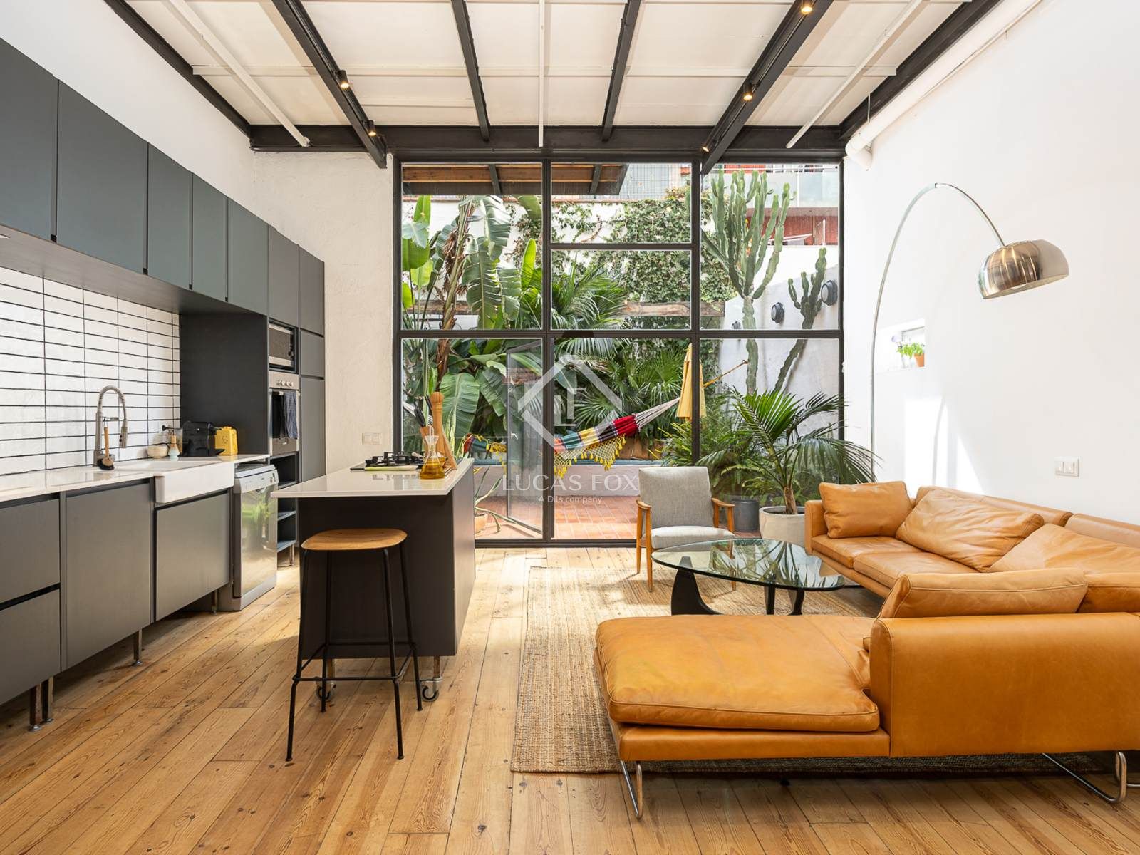 Sala d'estar de Loft de lloguer en  Barcelona Capital amb Aire condicionat, Calefacció i Jardí privat