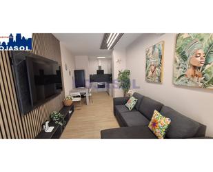 Sala d'estar de Apartament de lloguer en Noja amb Aire condicionat