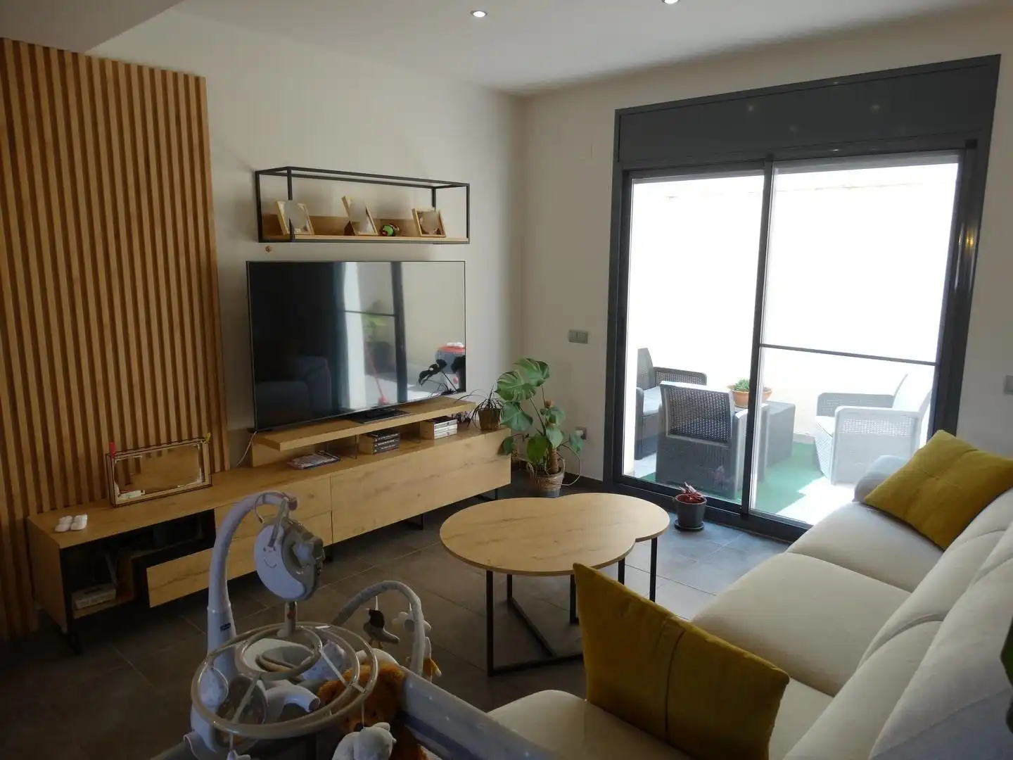Sala de estar de Casa adosada en venta en L'Aldea con Jardín privado, Terraza y Trastero