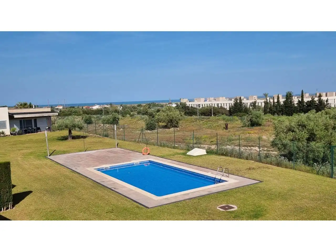 Swimming pool of Flat for sale in L'Ampolla  with Air Conditioner, Heating and Balcony