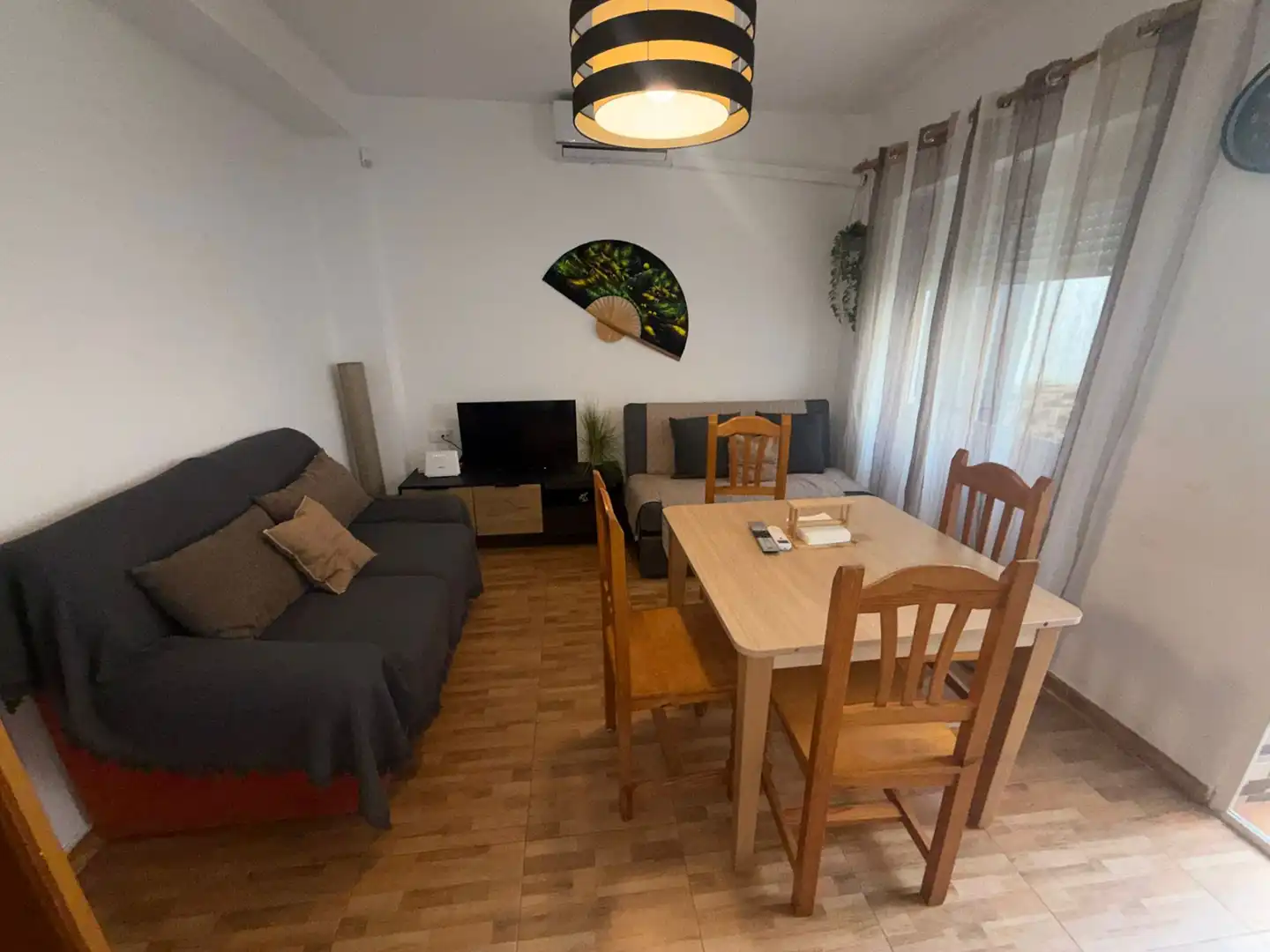 Sala d'estar de Casa adosada en venda en Granada amb Aire condicionat, Calefacció i Jardí privat