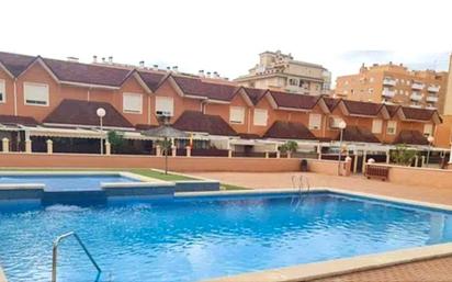 Piscina de Casa adosada en venda en Elche / Elx amb Aire condicionat, Terrassa i Piscina comunitària