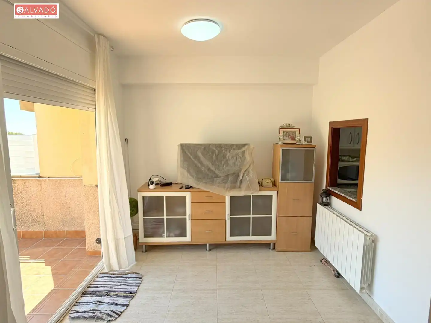 Sala de estar de Casa adosada en venta en Calafell con Calefacción, Jardín privado y Terraza