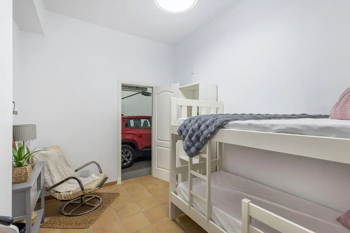 Habitación de Casa adosada en venta en Motril con Terraza, Balcón y Piscina comunitaria