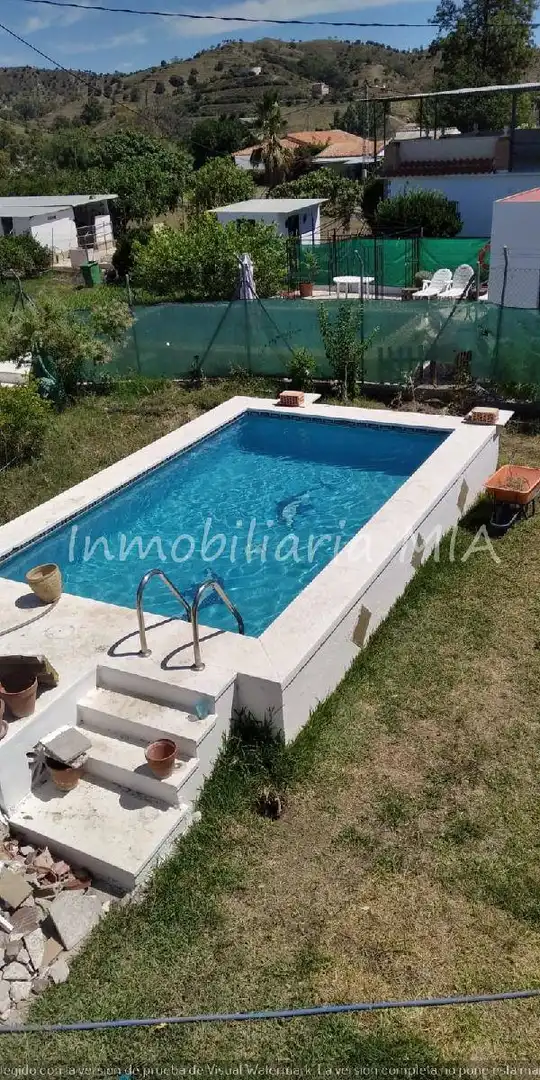 Piscina de Casa o xalet en venda en Coín
