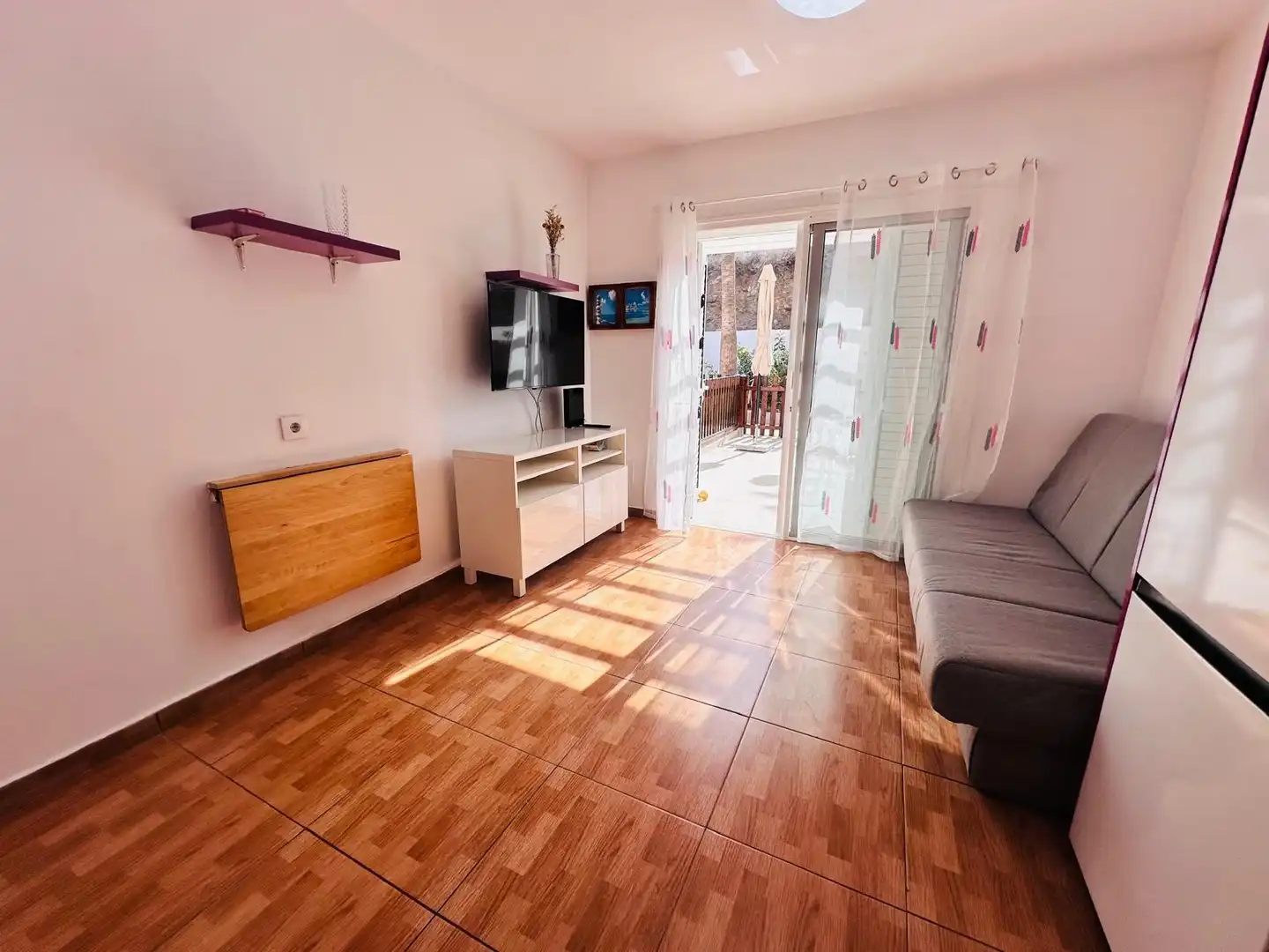Sala d'estar de Casa o xalet de lloguer en San Bartolomé de Tirajana amb Aire condicionat, Jardí privat i Terrassa
