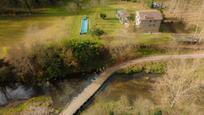 Piscina de Finca rústica en venda en Sant Joan Les Fonts amb Aire condicionat, Calefacció i Jardí privat