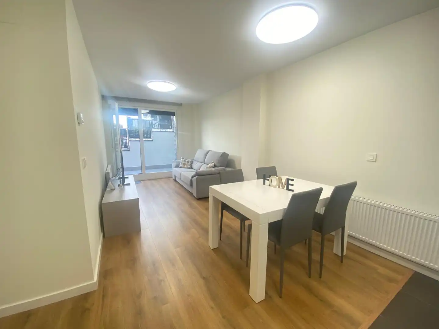 Sala de estar de Piso en venta en Castro-Urdiales con Calefacción, Jardín privado y Terraza
