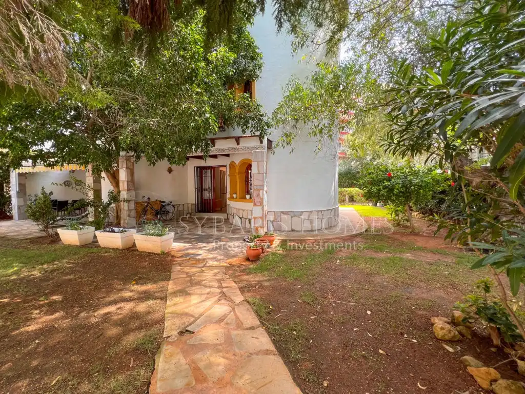 Garten von Einfamilien-Reihenhaus zum Verkauf in Dénia mit Klimaanlage und Gemeinschaftspool