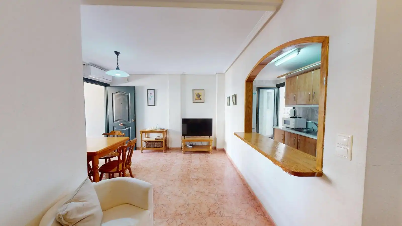 Sala d'estar de Apartament en venda en Los Alcázares amb Aire condicionat, Terrassa i Moblat