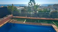 Swimming pool of Single-family semi-detached for sale in Calella  with Air Conditioner, Terrace and Swimming Pool