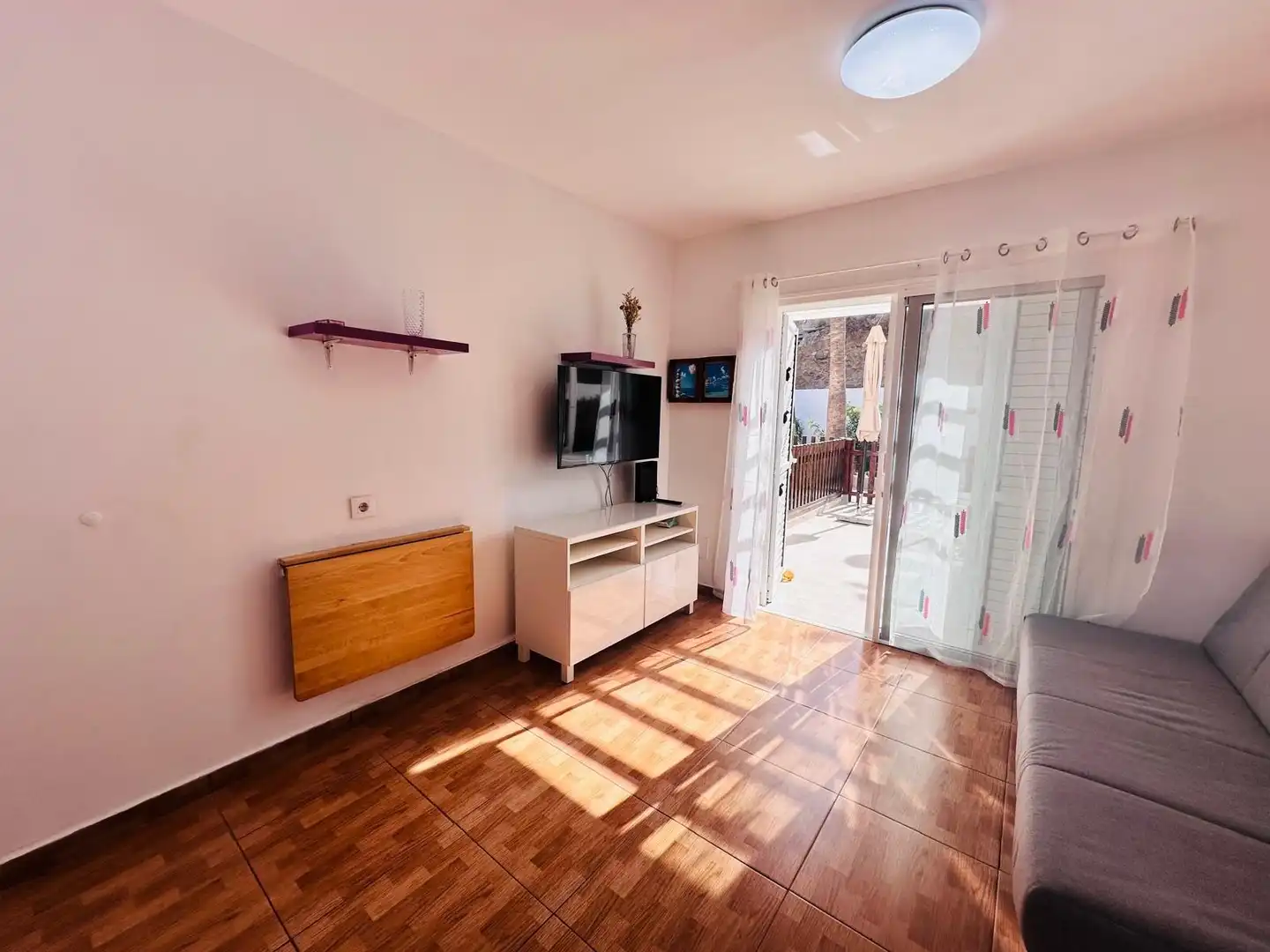 Sala d'estar de Casa o xalet de lloguer en San Bartolomé de Tirajana amb Aire condicionat, Jardí privat i Terrassa