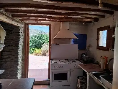 Cuina de Finca rústica en venda en Alpujarra de la Sierra amb Calefacció, Jardí privat i Moblat