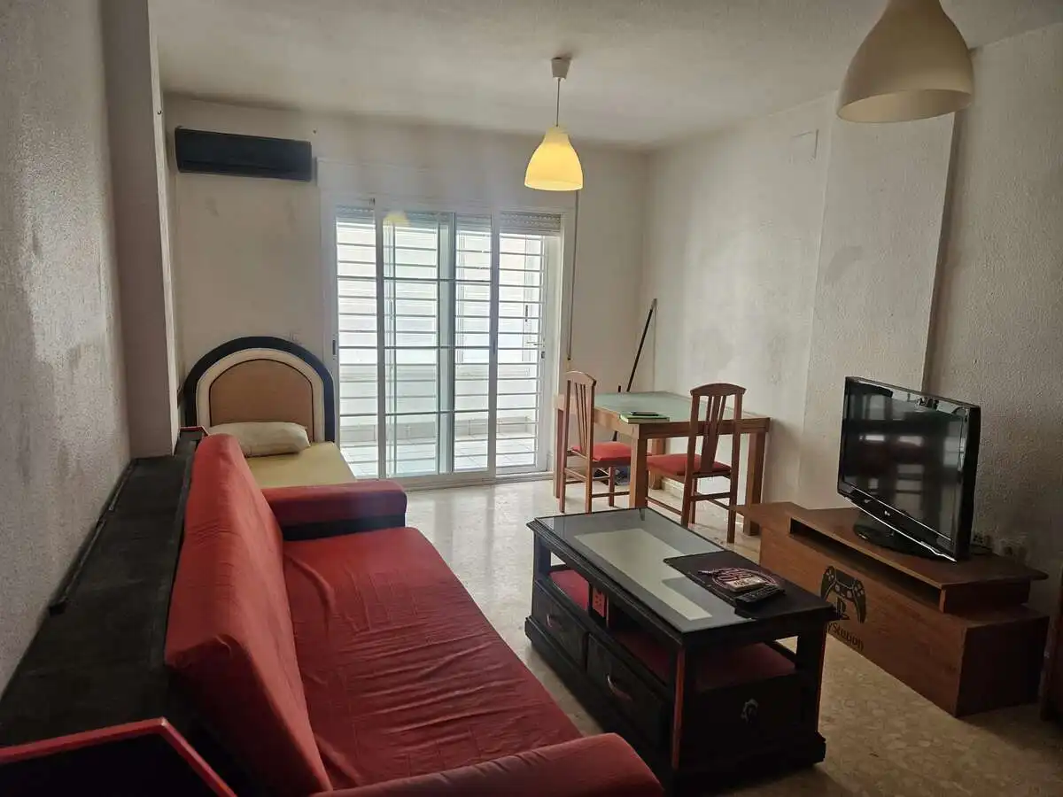 Sala d'estar de Pis en venda en Roquetas de Mar amb Aire condicionat, Terrassa i Moblat