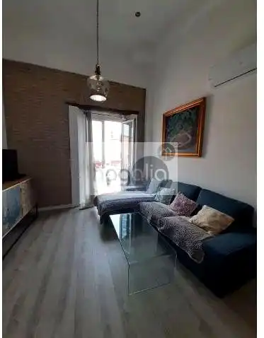 Sala d'estar de Dúplex de lloguer en Sevilla amb Aire condicionat, Terrassa i Moblat