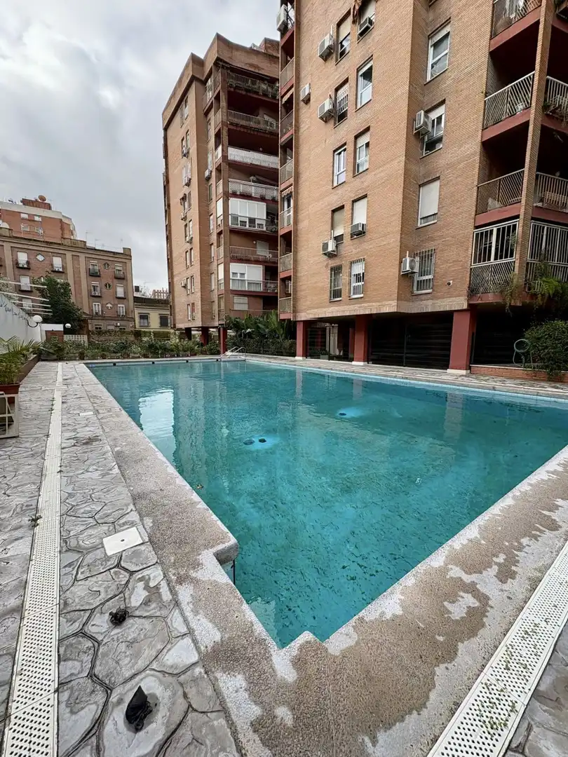 Swimming pool of Flat for sale in Sevilla  with Air Conditioner, Heating and Terrace