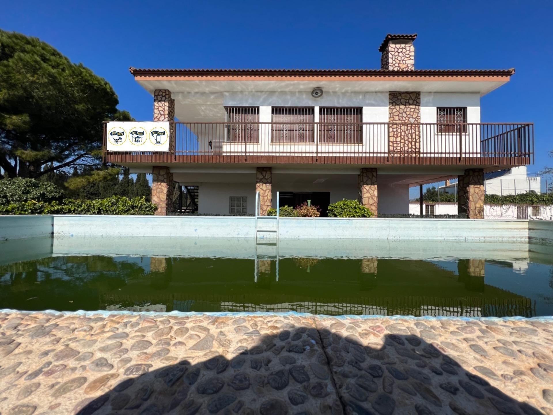 Swimming pool of House or chalet for sale in L'Aldea  with Air Conditioner, Heating and Private garden