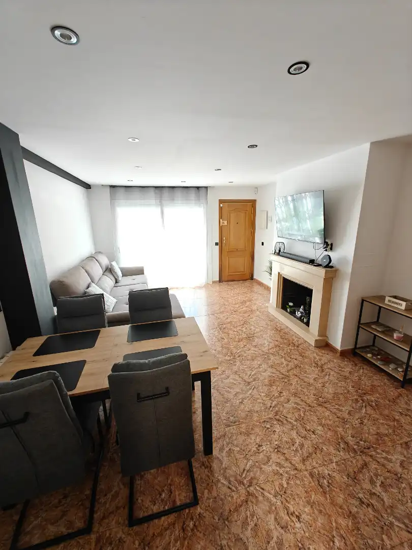 Sala de estar de Casa adosada en venta en Premià de Mar con Aire acondicionado, Calefacción y Piscina comunitaria