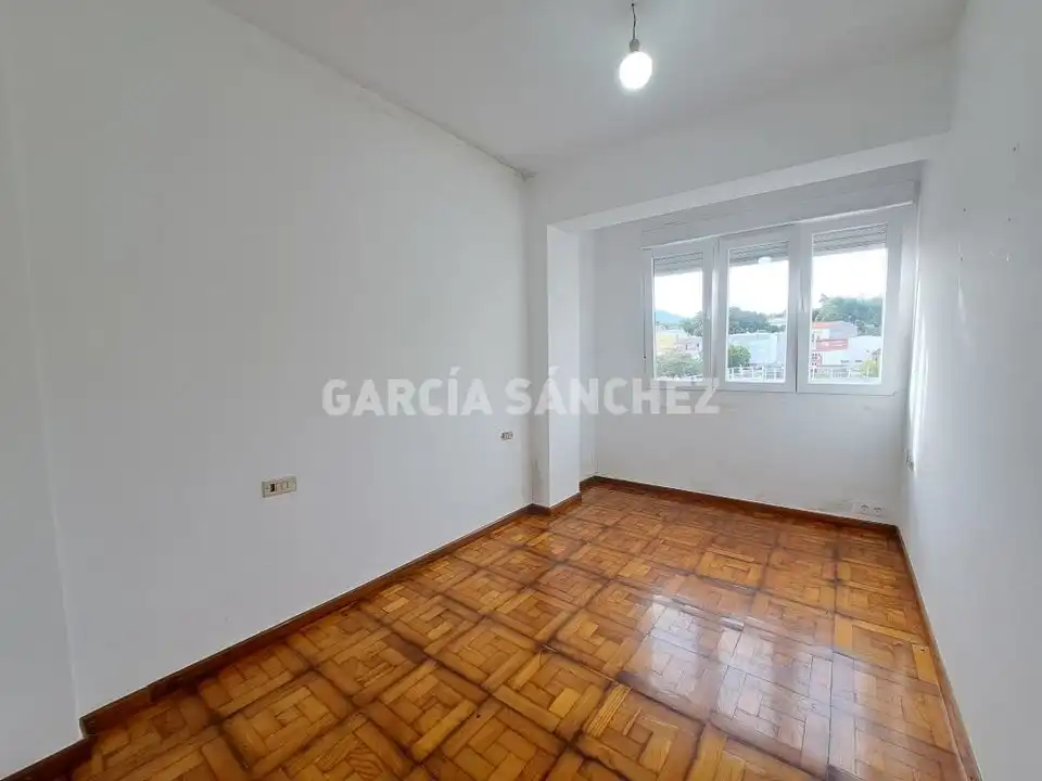 Schlafzimmer von Wohnung zum Verkauf in Boiro