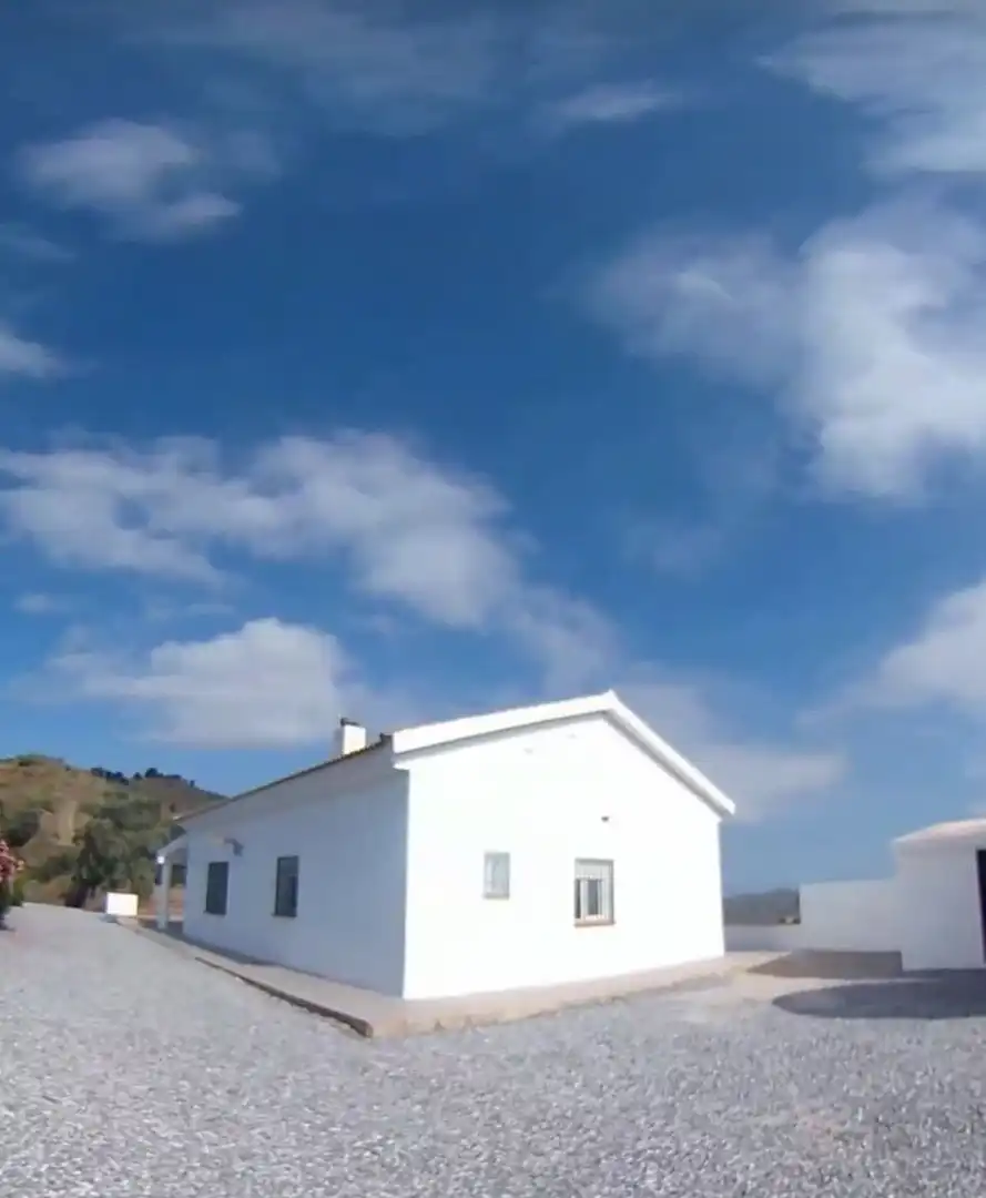Vista exterior de Finca rústica en venda en El Borge amb Jardí privat, Terrassa i Traster