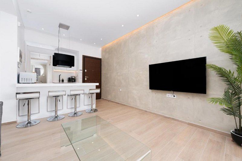 Sala de estar de Piso de alquiler en  Madrid Capital con Aire acondicionado, Amueblado y TV