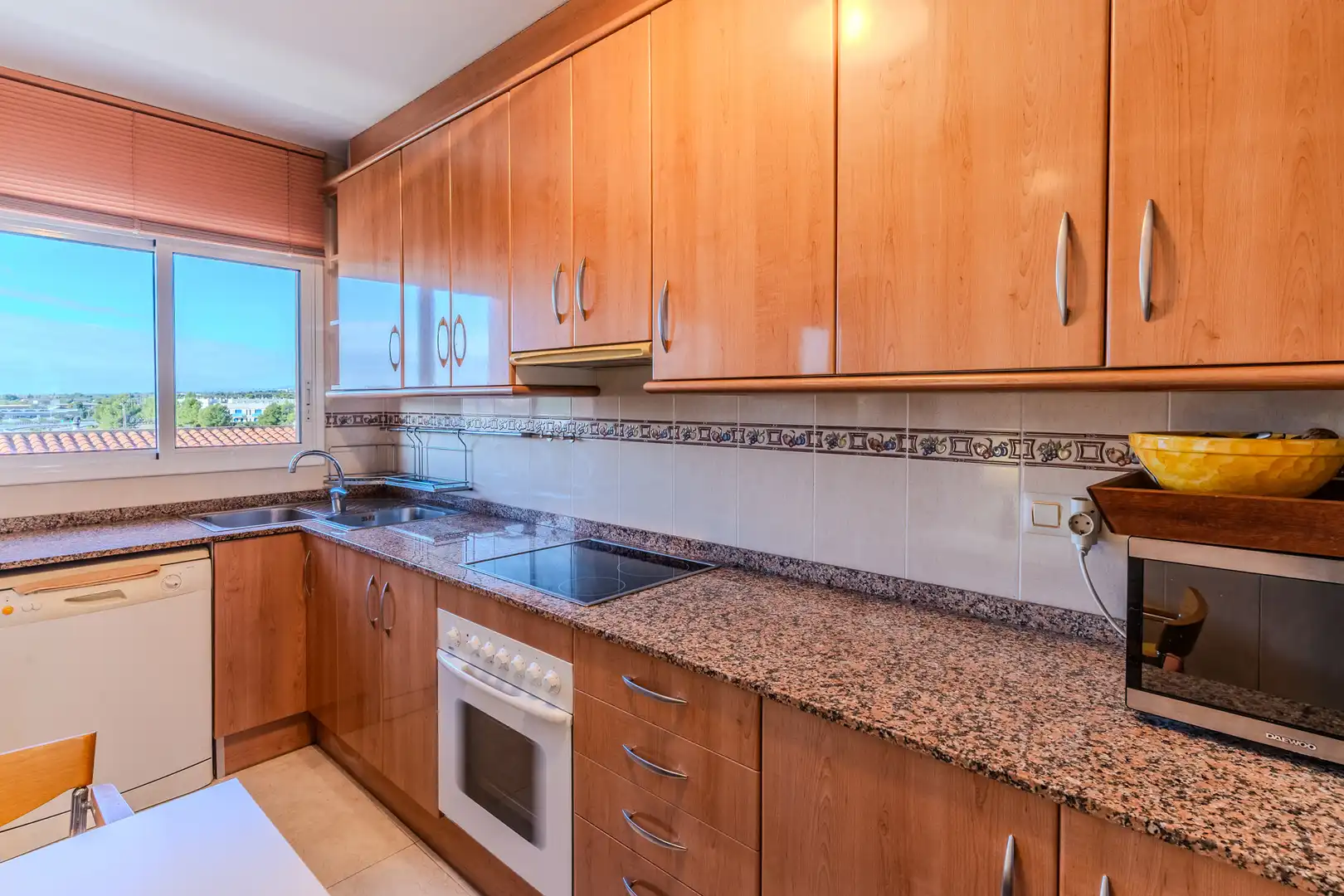 Cocina de Dúplex en venta en L'Ampolla con Aire acondicionado, Calefacción y Terraza