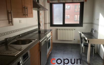 Kitchen of Flat for sale in Oviedo   with Heating, Parquet flooring and Storage room