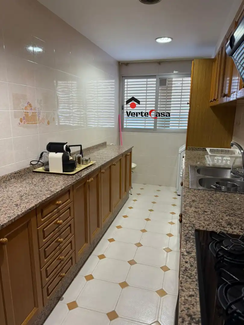Cuina de Apartament de lloguer en El Puig de Santa Maria amb Calefacció, Terrassa i Piscina comunitària