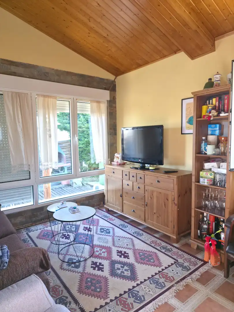 Living room of Houses for sale in Salinas de Pisuerga  with Private garden, Storage room and Swimming Pool
