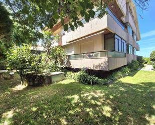 Garden of Duplex for sale in Nigrán  with Parquet flooring, Terrace and Storage room