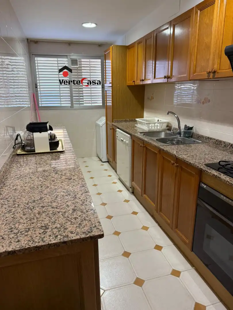 Cuina de Apartament de lloguer en El Puig de Santa Maria amb Calefacció, Terrassa i Piscina comunitària