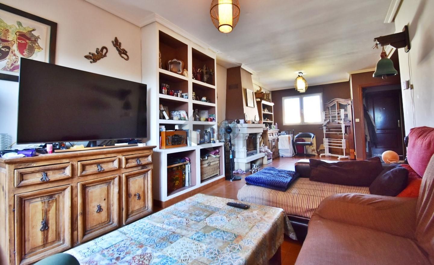 Sala d'estar de Casa adosada en venda en Fuensaldaña amb Calefacció i Jardí privat