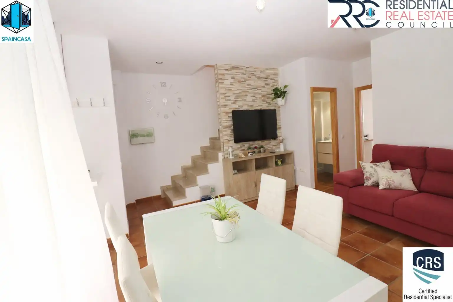 Sala de estar de Casa adosada en venta en Cartaya con Alarma