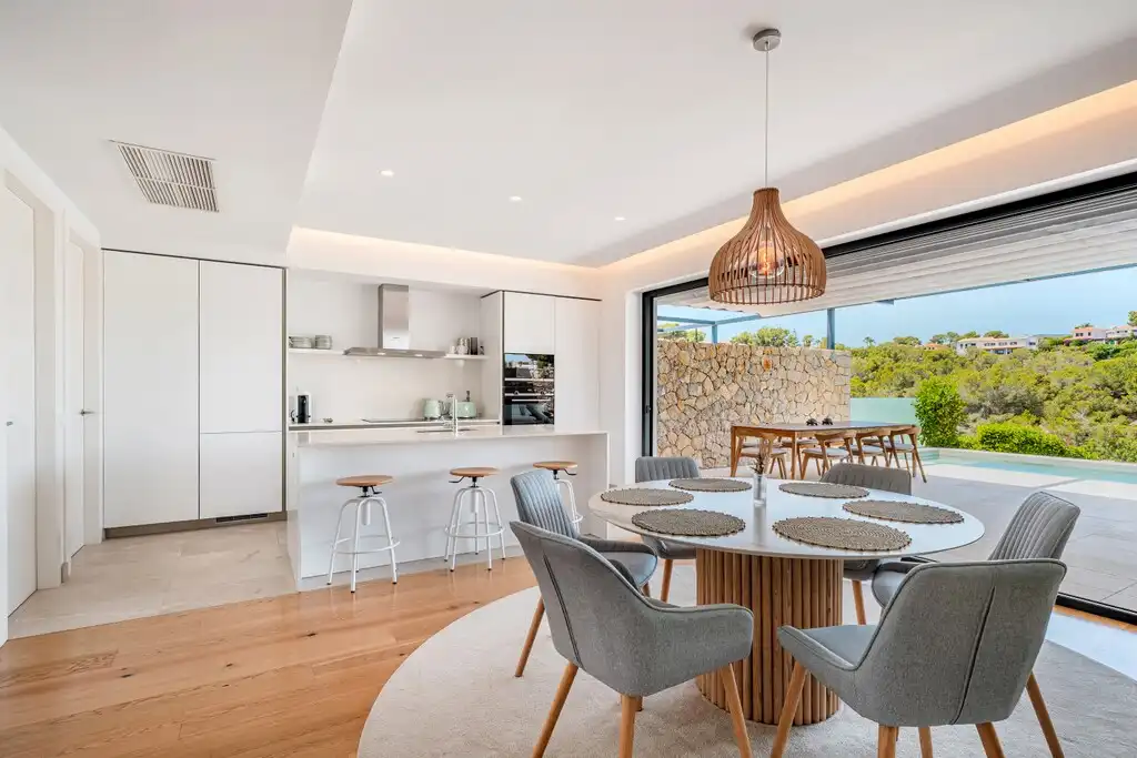 Dining room of Detached homes for sale in Calvià  with Air Conditioner, Private garden and Terrace