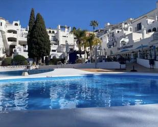 Swimming pool of Apartment for sale in Benalmádena  with Air Conditioner, Private garden and Terrace