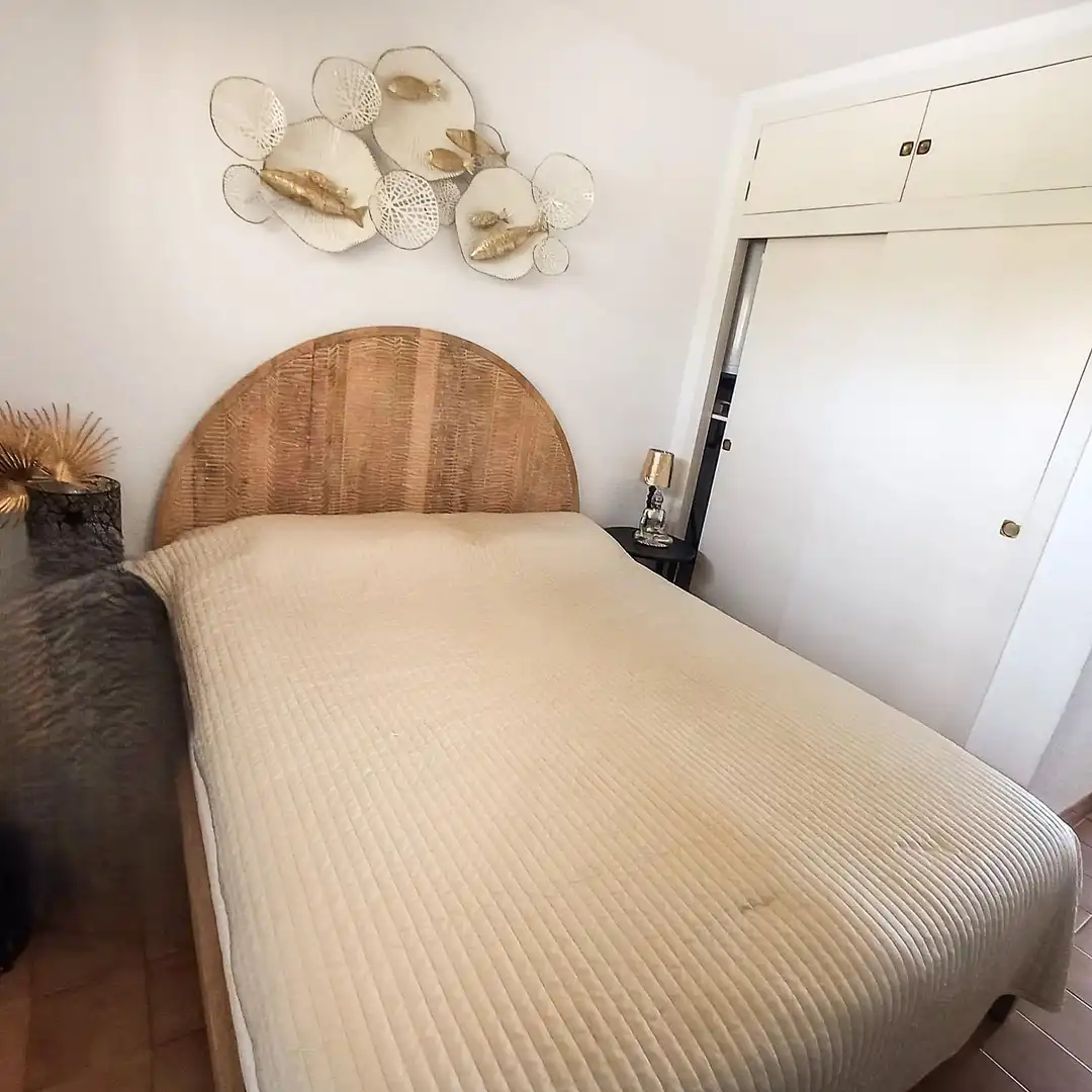 Habitación de Apartamento de alquiler en L'Alfàs del Pi con Aire acondicionado, Jardín privado y Terraza