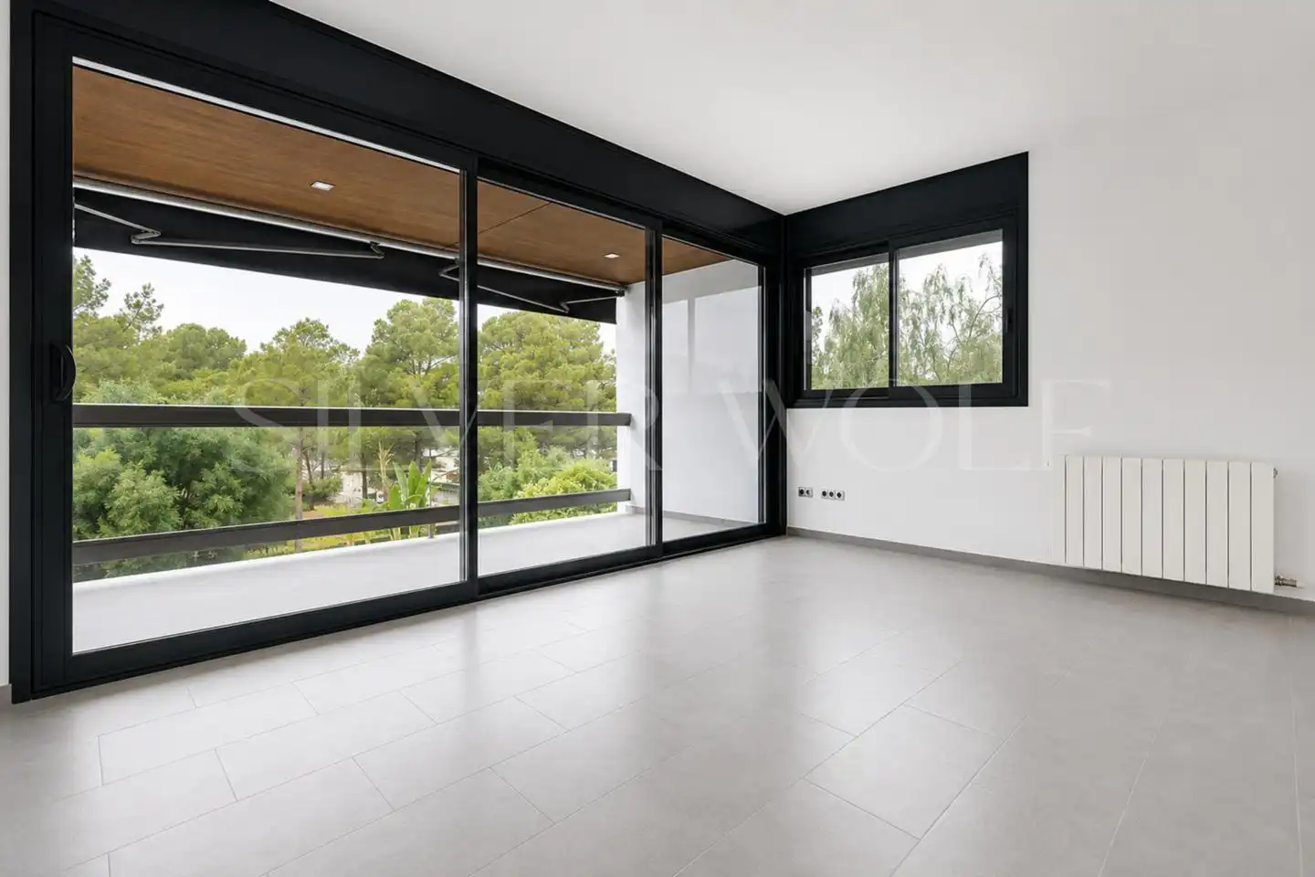 Sala de estar de Casa adosada de alquiler en Sant Pere de Ribes con Aire acondicionado, Calefacción y Jardín privado