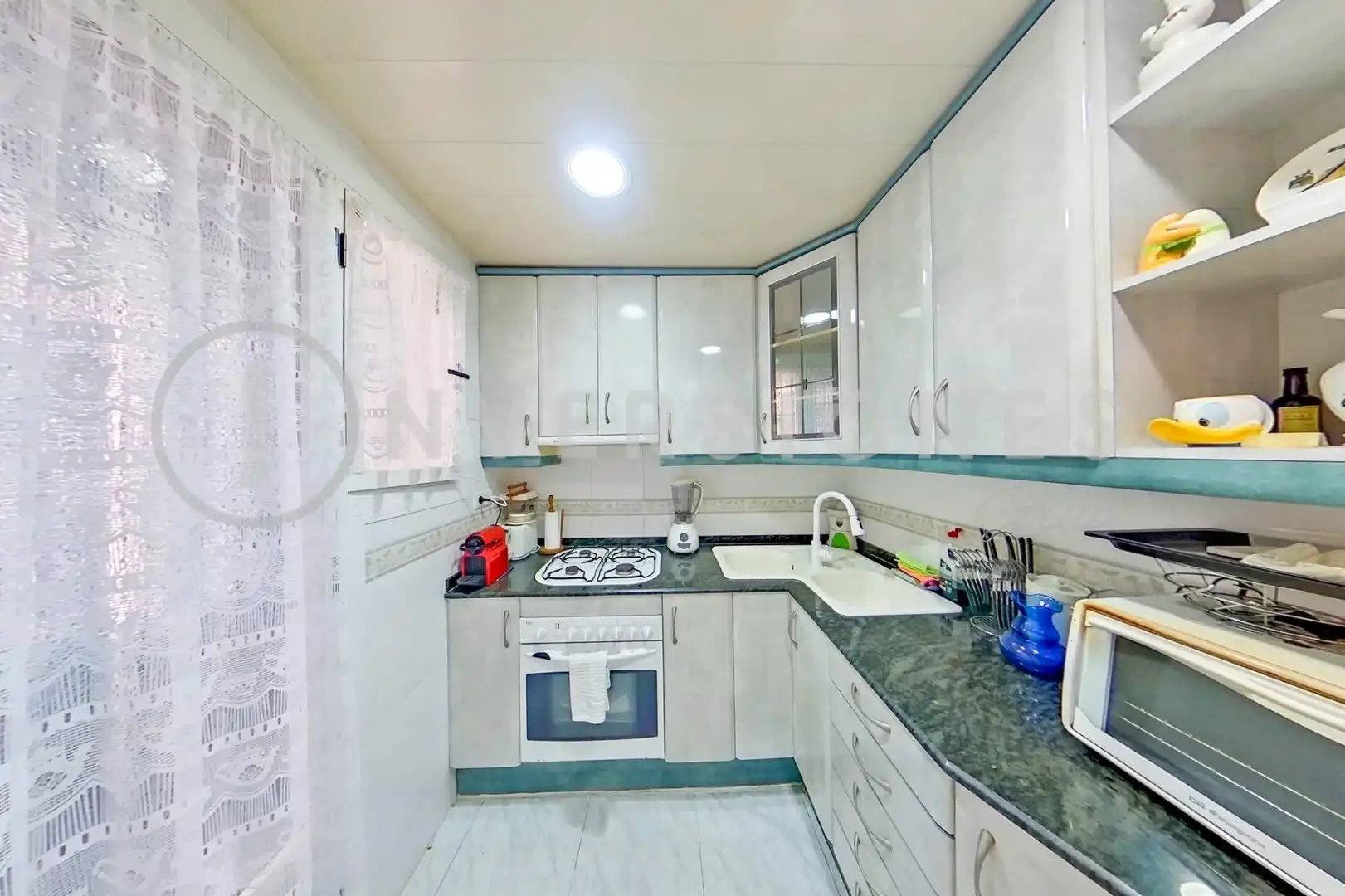 Kitchen of Flat for sale in Sabadell  with Air Conditioner and Balcony