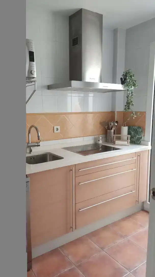 Cuina de Casa adosada de lloguer en Islantilla amb Aire condicionat, Piscina i Balcó