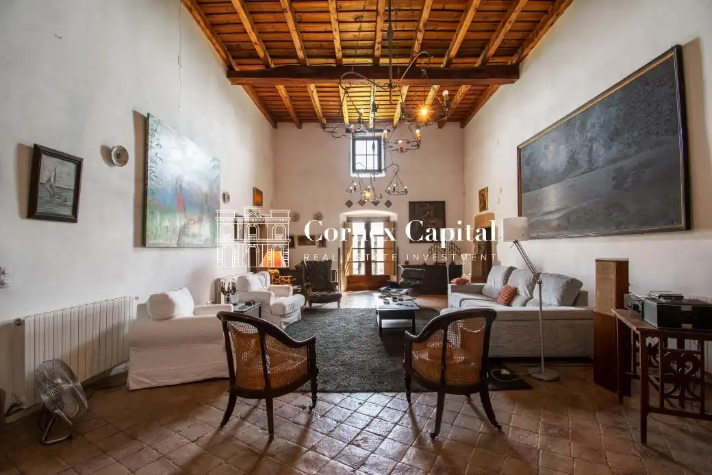 Sala de estar de Finca rústica de alquiler en Rupià con Aire acondicionado, Calefacción y Jardín privado