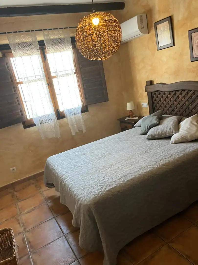 Dormitori de Finca rústica de lloguer en Sedella amb Aire condicionat, Jardí privat i Traster