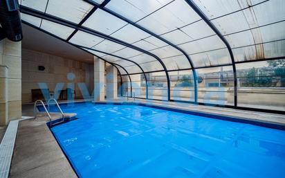 Swimming pool of Flat for sale in  Madrid Capital  with Air Conditioner, Heating and Storage room