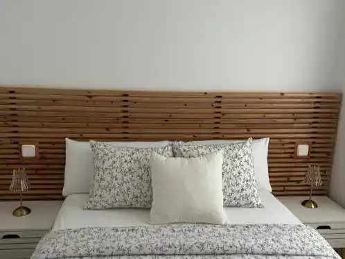 Dormitori de Apartament de lloguer en Oliva amb Aire condicionat, Piscina i Moblat