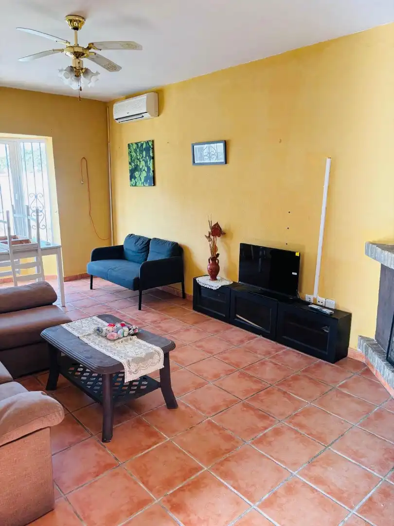 Sala d'estar de Casa o xalet en venda en Chiclana de la Frontera amb Jardí privat, Traster i Piscina