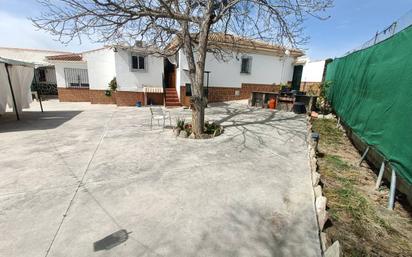 Exterior view of House or chalet for sale in Huétor Tájar  with Air Conditioner, Heating and Private garden