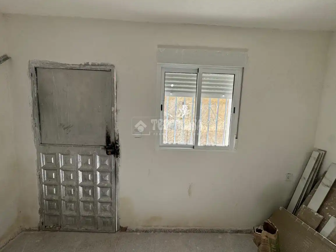 Habitación de Casa adosada en venta en Iznalloz