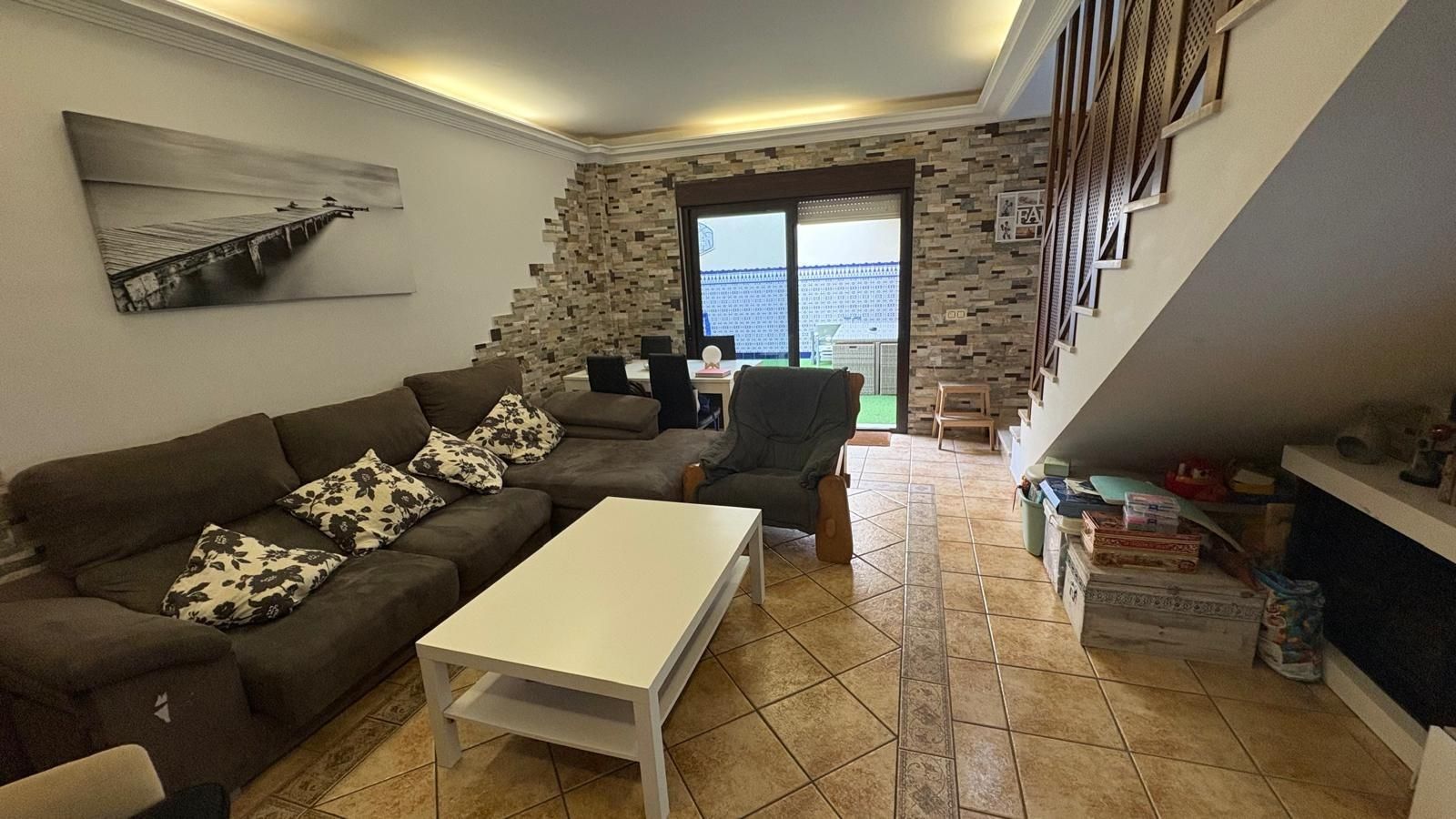 Sala d'estar de Casa adosada en venda en Chiclana de la Frontera