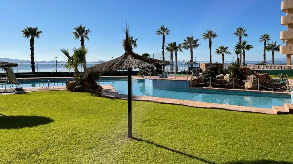 Piscina de Apartamento en venta en La Manga del Mar Menor con Calefacción, Jardín privado y Terraza