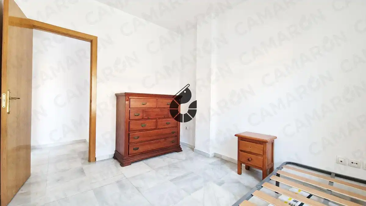 Dormitori de Casa adosada en venda en Coria del Río amb Jardí privat, Terrassa i Alarma