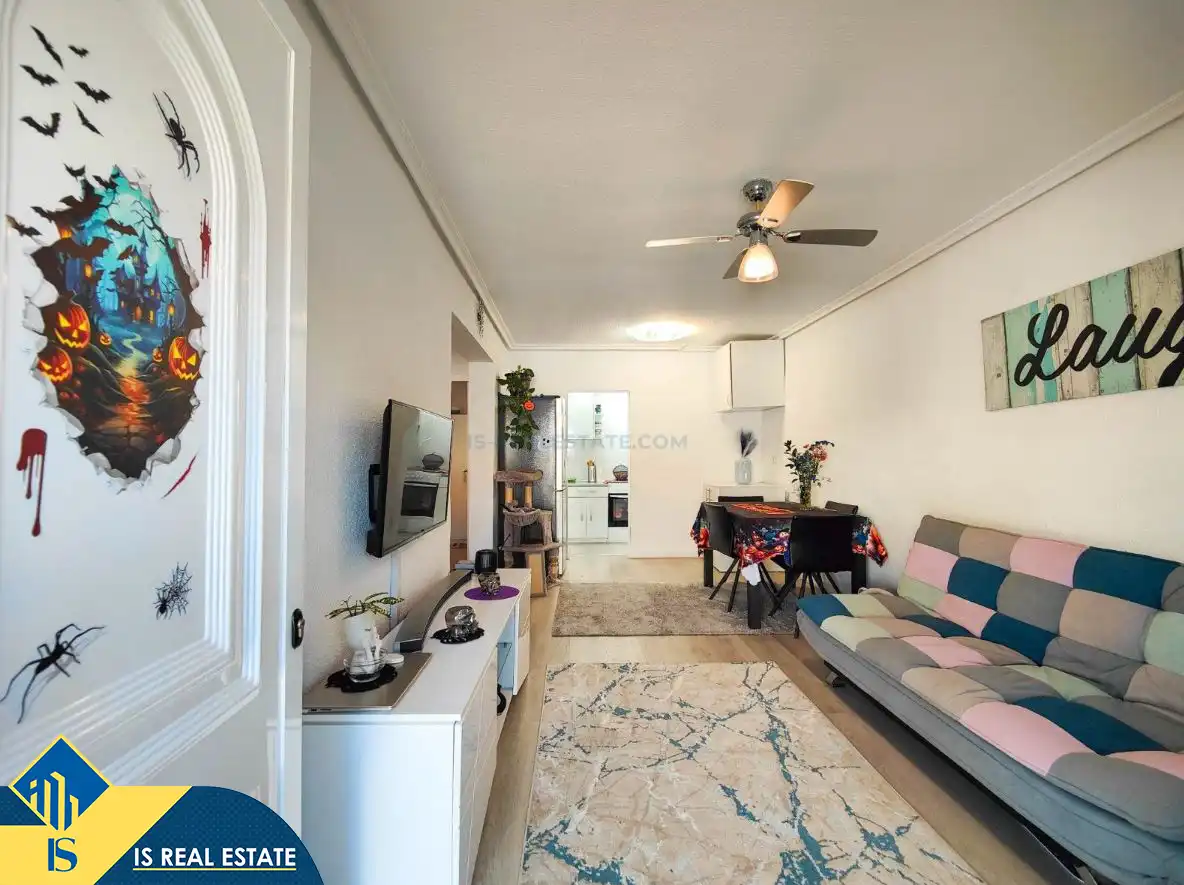 Sala de estar de Casa adosada en venta en Torrevieja con Aire acondicionado, Calefacción y Jardín privado